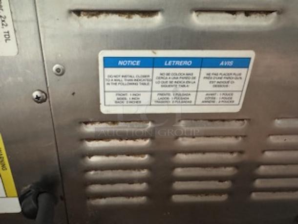 Meister Cook DMW-22-TDL heated holding unit, stainless steel construction, dual chambers, with usage instructions label.