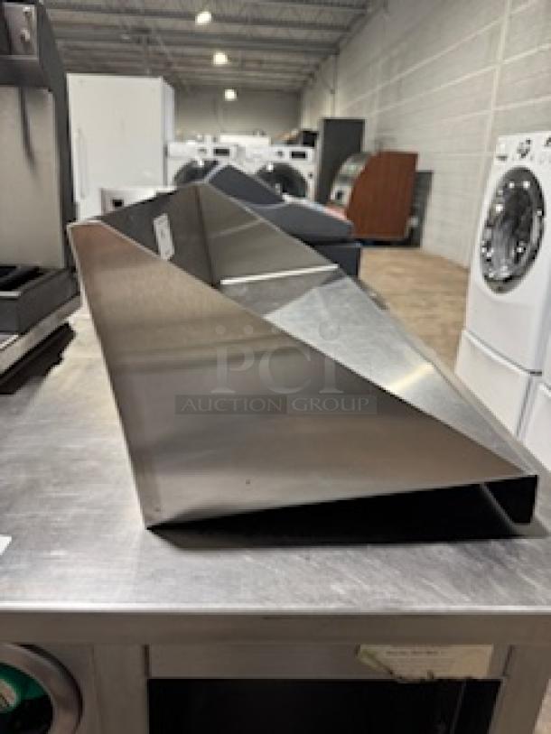 HEAVY DUTY 36" stainless steel wall shelf, shown in excellent condition. Ideal for kitchen or commercial use.