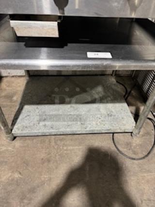 Regency 30" x 36" stainless steel equipment stand with galvanized undershelf, 16-gauge, sturdy, used condition.