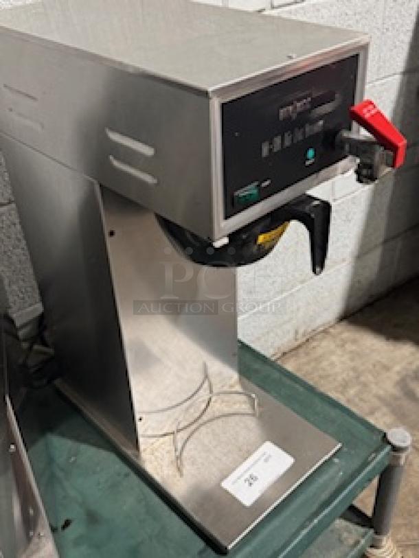 Bregmatic Model 1010546 commercial coffee maker, 120V, stainless steel, sleek design, digital display; gently used condition.