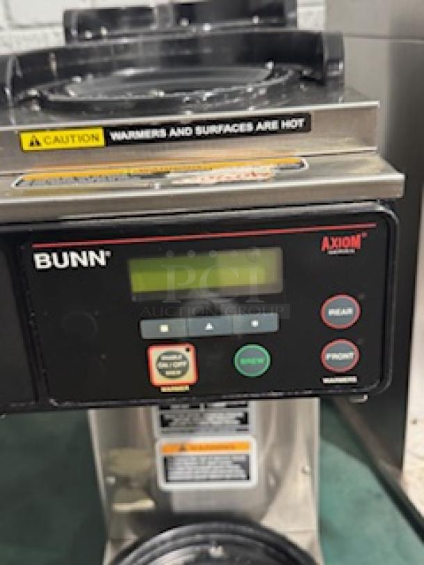 BUNN AXIOM-3 coffee brewer with LCD display, two upper and one lower warmer. Visible caution labels. Good condition.