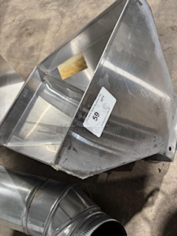 Proline wall-mounted range hood, ducted, 900/1200 CFM, stainless steel, showing vent components. Visible tag marked "59".