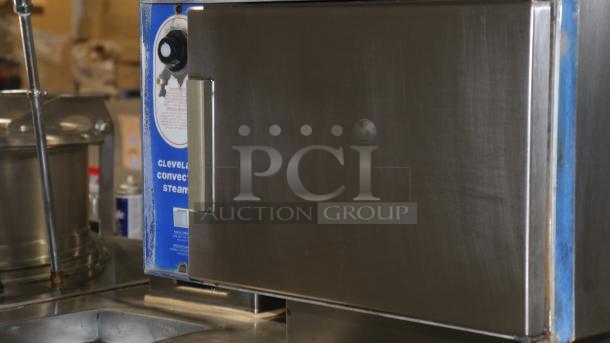 Cleveland Double-Deck Electric Convection Steamer, Model x2d0tle, with 6-Gallon Kettle. Stainless steel, good condition.