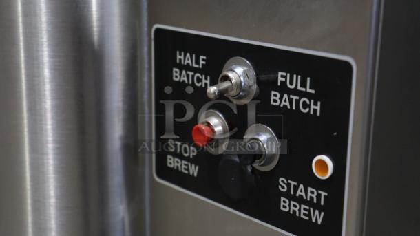 American Metal Ware 7776E coffee brewer controls, featuring half/full batch, stop/start brew switches. Stainless steel finish.