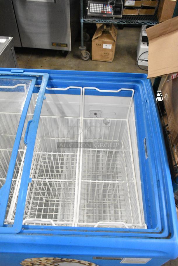 AHT RIO S 100 commercial chest freezer on casters, missing right side glass pane. Tested, 115V, 1 phase, working condition.