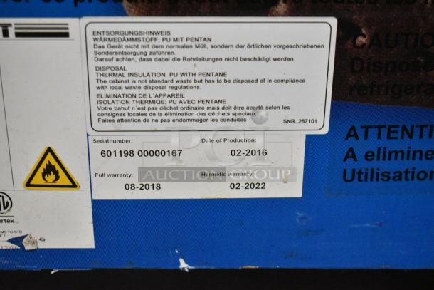 Label on AHT RIO S 100 commercial chest freezer; shows serial number, production date 02-2016, and warranty dates.