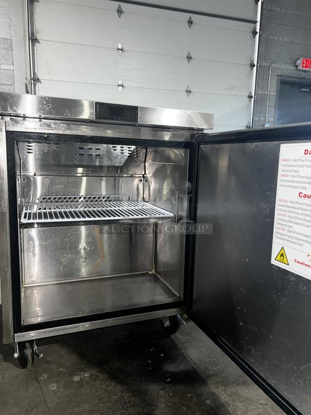 BERG BERS27 8 Pan 1-Door Sandwich Prep Table, stainless steel, open door, interior shelf, label with warnings visible.
