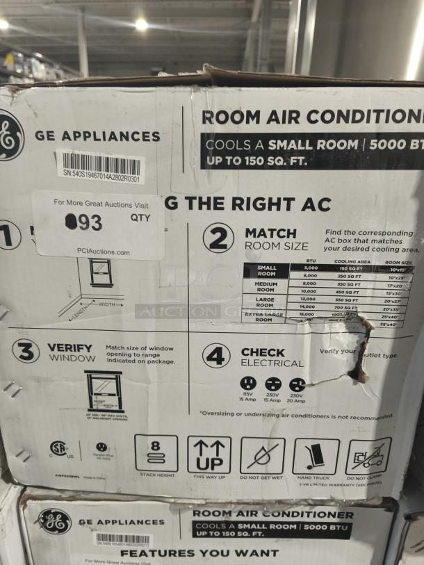Brand new GE® 5,000 BTU mechanical window air conditioner, model AWFS05BWL, in original box with minor dents.