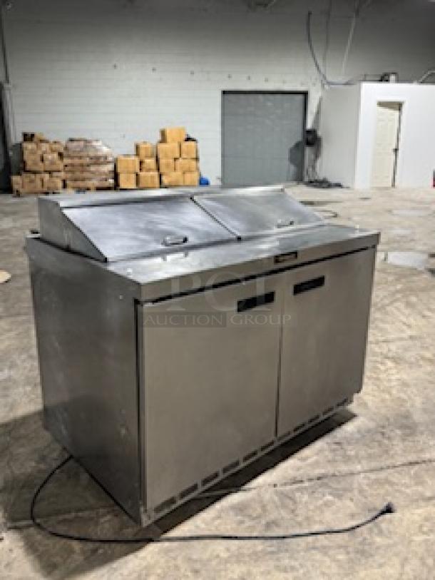 Delfield 4464NP-16, 64" refrigerated sandwich prep table, stainless steel, 2 doors, front breathing, 3" casters, tested.