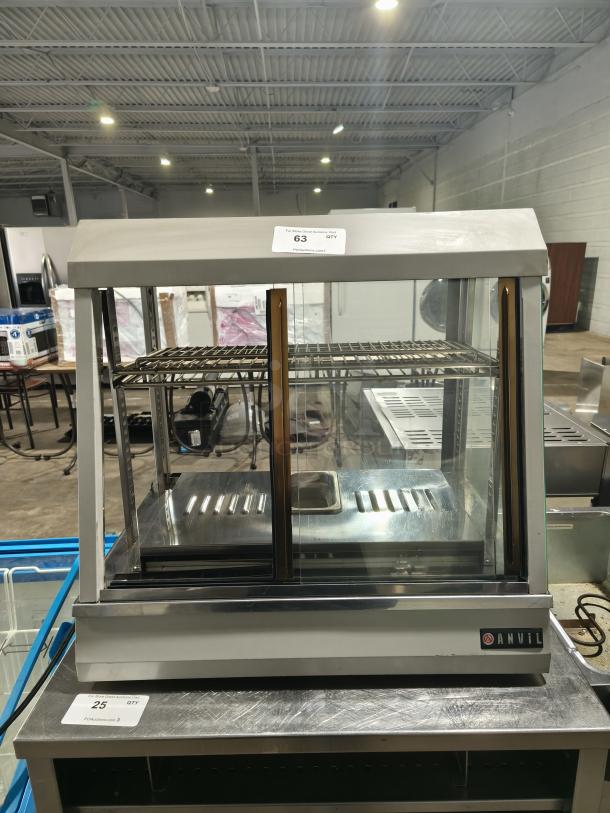 Anvil Hot Curved Countertop Display Cabinet, model DGH0540, glass missing, tested and working condition, labeled Anvil.