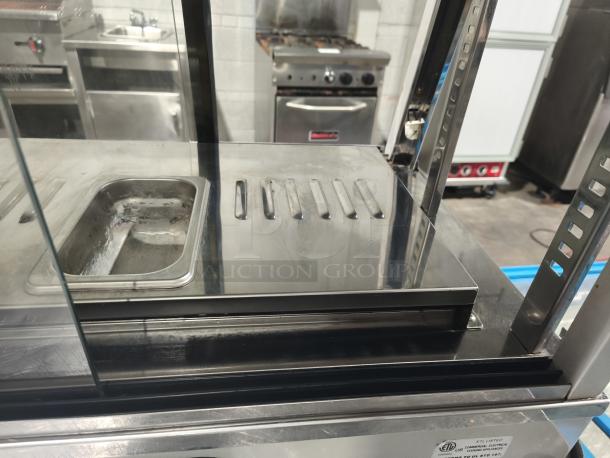 Anvil Hot Curved Countertop Display Cabinet DGH0540, missing glass panel, tested and working, features stainless steel interior.