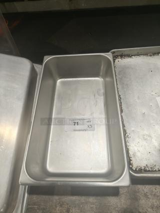 Commercial stainless steel 1/3 size hotel pan, good condition, auction tag indicates quantity 3, lot number 71.