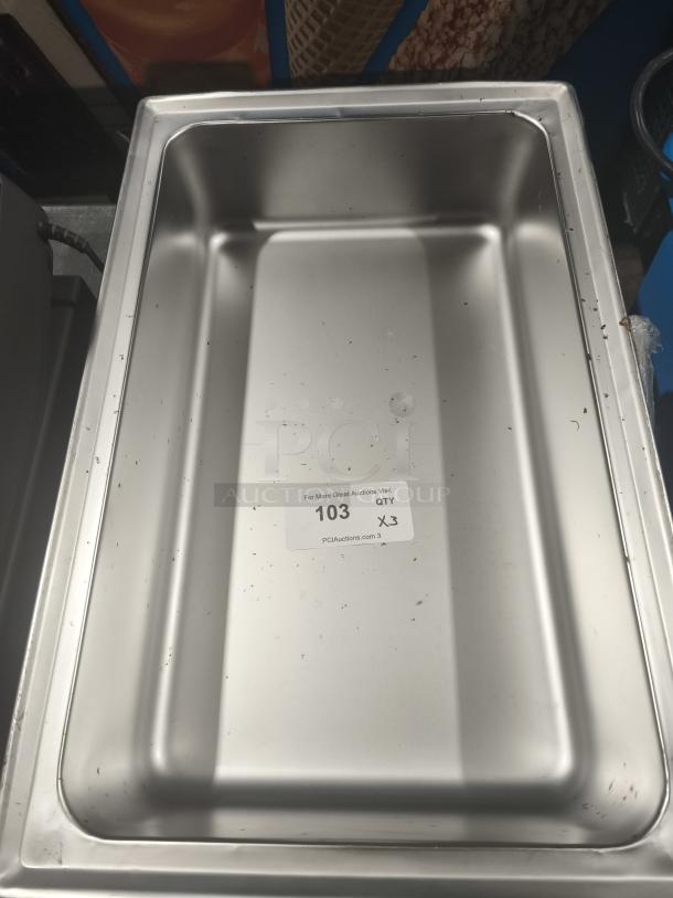 Stainless steel full-size hotel pan, 4" deep, showing minor wear. Label reads "103 QTY x3 PCIAuctions.com".
