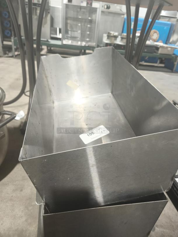 Stainless steel commercial bus tub/utility bin, metal finish, rectangular, visible use wear, with a label marked "105".