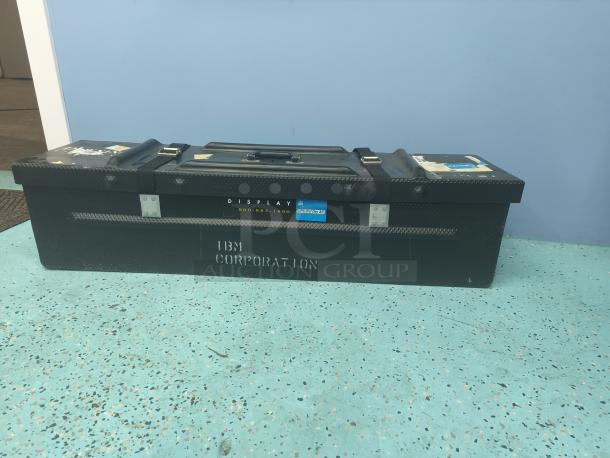 Downing Displays hard-sided shipping/display case with IBM Corporation marking. Features secure latches. Good condition.