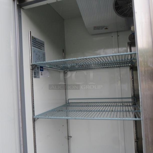 Avantco stainless steel refrigerator, model 178A49RHC, with 6 racks, on casters. Measures 54x32.5x83 inches. 115 Volt.
