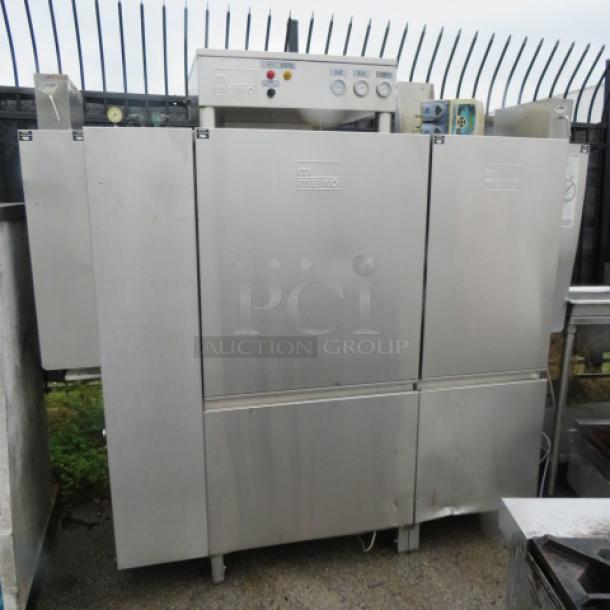 Meiko K66ET conveyor dishwasher, stainless steel finish, 460V, 3 phase, 82x32x75, in used condition, model labels visible.