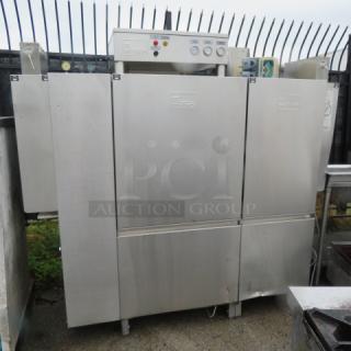 Meiko K66ET conveyor dishwasher, stainless steel finish, 460V, 3 phase, 82x32x75, in used condition, model labels visible.
