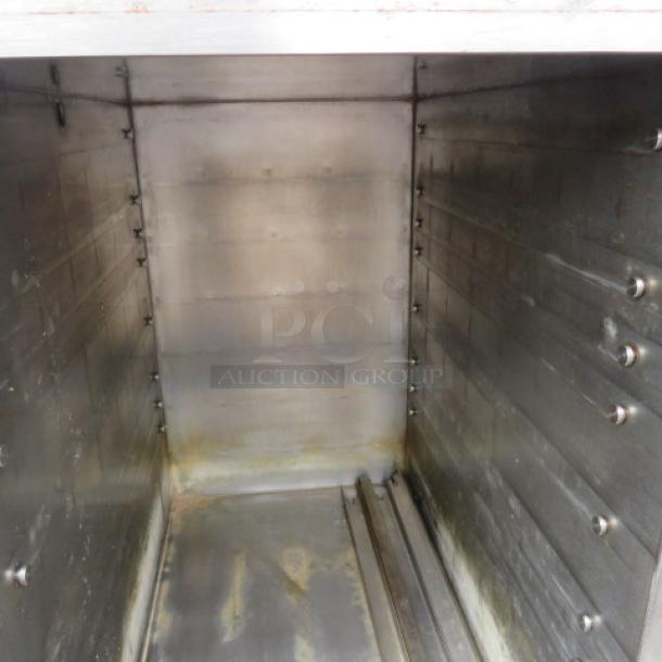 Accutemp Steam And Hold oven interior, Model 208D6-300, showing stainless steel walls, 23x26x30, used condition.