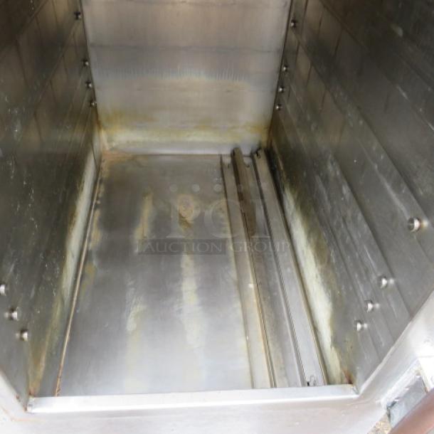 Accutemp Steam and Hold Model 208D6-300, 23x26x30, stainless interior, 208V, used condition with visible wear.