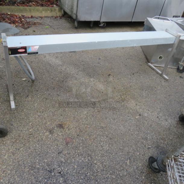 Hatco Glo Ray food warmer, Model GRAH-60, 120 Volt, 60x13x18, in used condition. Metal frame visible.