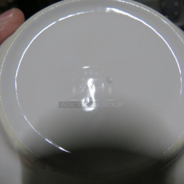 6-inch Pfaltzgraff bowl, bottom view showing subtle markings. Smooth white ceramic, excellent condition.