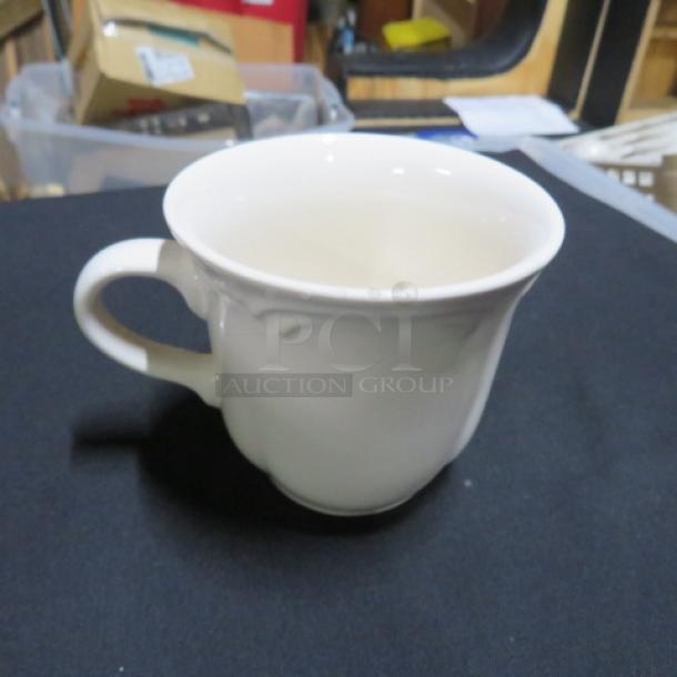 Pfaltzgraff coffee cup, ivory color, gently used, 12XBID model, classic design, no visible markings or damage.