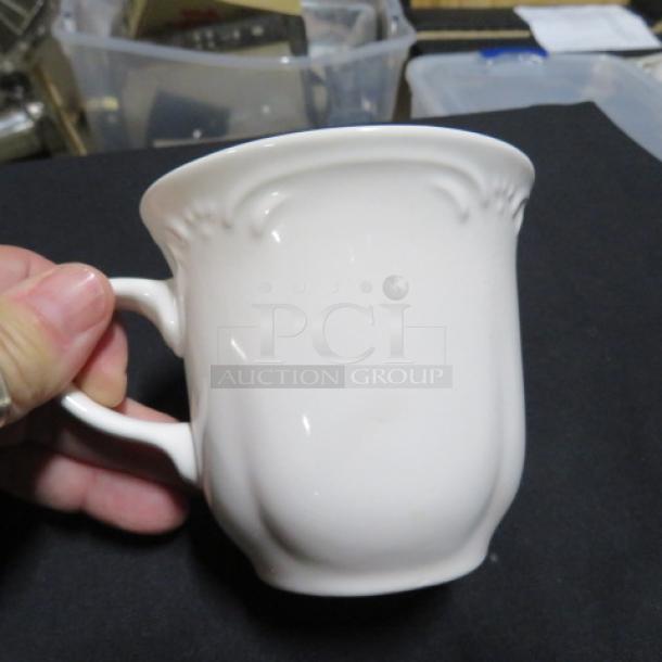 Pfaltzgraff white ceramic coffee cup, fluted design, excellent condition, model 12XBID.