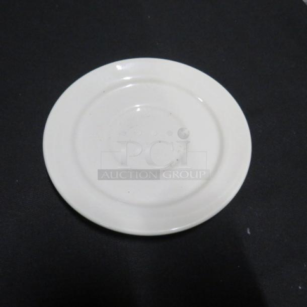 5.5 Inch Sysco Saucer, white, circular design, light surface wear, model 12XBID, ceramic material.