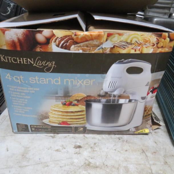 Kitchen Living 4 Quart Stand Mixer in box; features include stainless steel bowl and beaters; new condition; branded packaging.