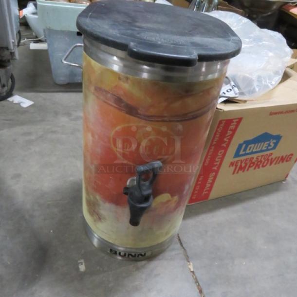 Bunn Stainless Steel Tea Satellite with Royal Cup branding, spigot, and lid. In used condition.