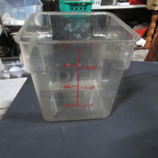 8 quart clear food storage container with red measurement markings up to 8 quarts and 7.5 liters. Good condition.