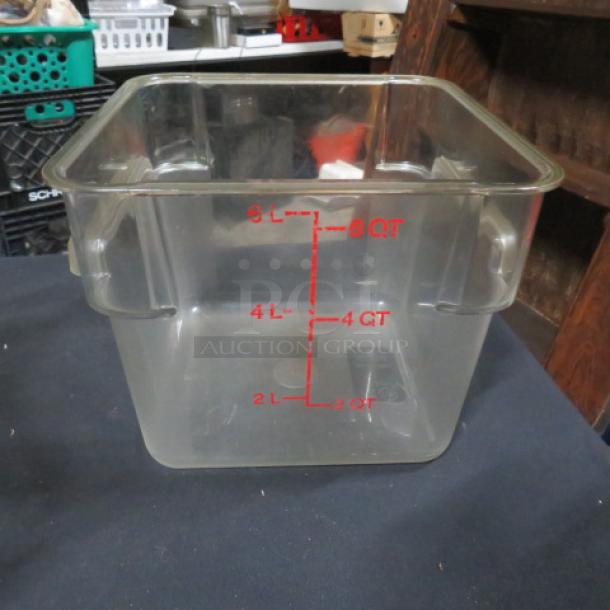 Clear 6-quart square food storage container with red measurement markings. Durable plastic, excellent condition.