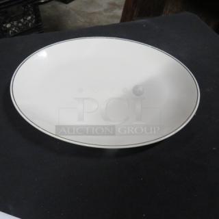 13x10 white china platter with silver rim, 3XBID, in excellent condition.