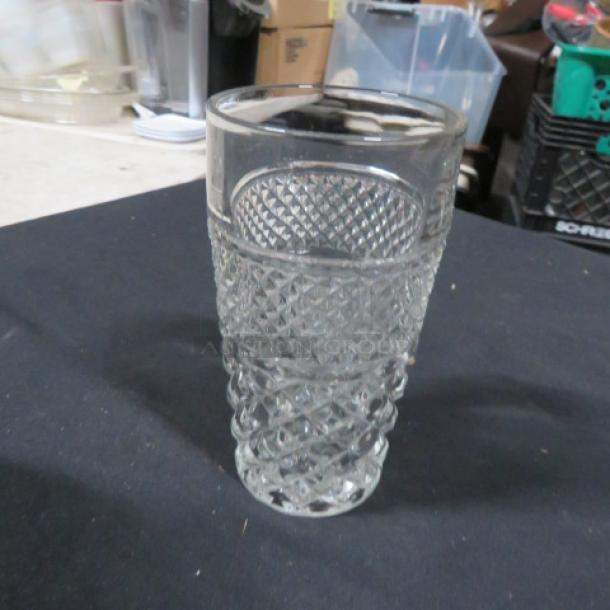 Cut glass beverage/bar glass with intricate diamond pattern. Excellent condition, transparent, cylindrical shape.