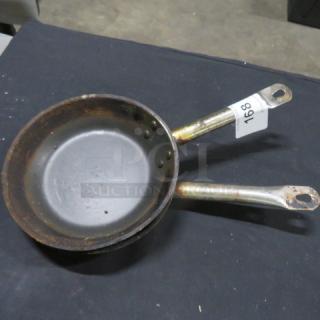 8.5-inch sauté pan with visible wear, metal handles, and auction tag marked "168". Model 2XBID.