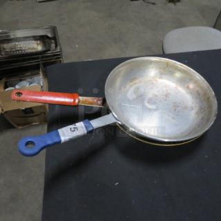 10-inch sauté pan with Kool Touch handle, used condition, visible wear. Includes both blue and red handles.