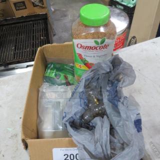 Box with Osmocote plant food, garden supplies, and miscellaneous items. Condition appears used.