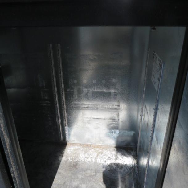 True 2 Door Back Bar Cooler, Model TBB-24-48, stainless steel top, 115 Volt, interior view, used condition.