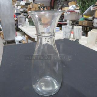 1-liter glass carafe with wide mouth and narrow neck, marked "1L" on the side; in good condition.