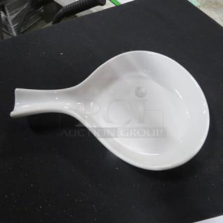 Tuxton 11x8 inch white serving dish, model 17, oval shape with handle, glossy finish, excellent condition.