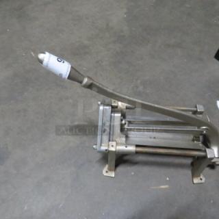 Heavy-duty fry/vegetable cutter with a long lever and metal frame, used condition, suitable for efficient food preparation.