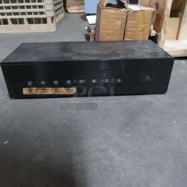 One Automatic Production AR1 108 multi-room speaker selection system, black, seven knob controls, visible wear, functioning condition.