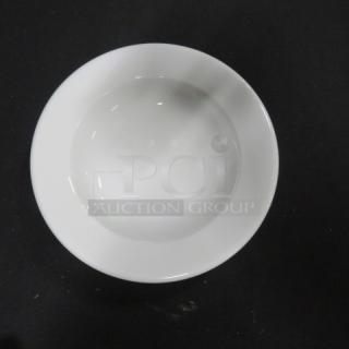 White 9-inch ceramic bowl with smooth, glossy finish, model 10XBID. Pristine condition, ideal for serving.