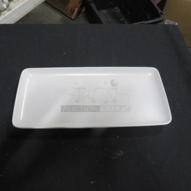 14x6.5 rectangular Evolution plate, white, clean surface, no visible markings, excellent condition.