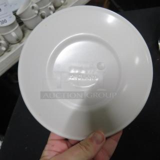 6.5 Inch EVC-VII Plate by Evolution, 10XBID. White ceramic with embossed branding on the bottom, in good condition.