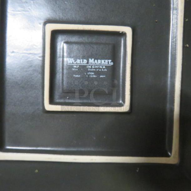 8-inch square World Market plate, black finish; marked made in China; dishwasher and microwave safe.