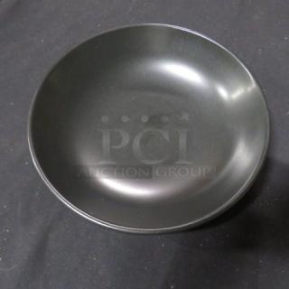 Black 9-inch bowl, smooth finish, model 7XBID. Excellent condition, round shape, minimal wear.