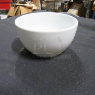 5-inch World Market bowl, white ceramic, smooth finish, excellent condition, no visible markings or defects.