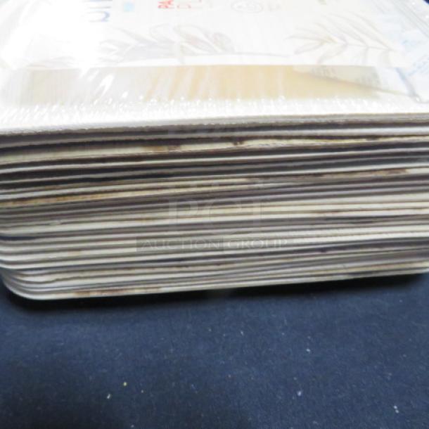 25 new 8" Brhees palm leaf plates in packaging, stack shown from side. Eco-friendly and natural look.